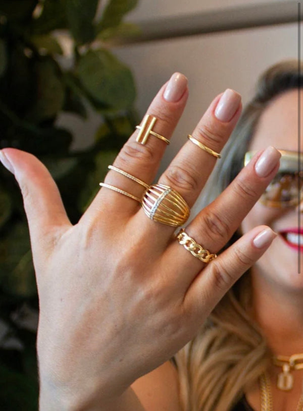 woman wearing 18K Gold filled bar ring as a knuckle ring.