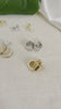 Parure - collection of jewelry from NAZ Parure including both the sterling silver and 14K gold plated small cuff huggies.