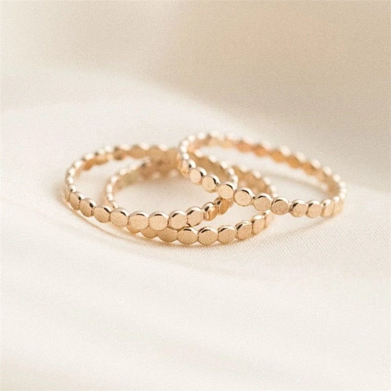 Three 14K Gold Filled Flat disc bands stacked on top of each other 