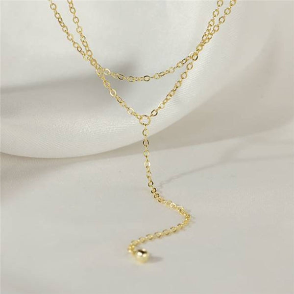 14K Gold filled Double Chain Y necklace with white fabric in background