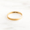 Gold filled authentication stamp on Infinity band.