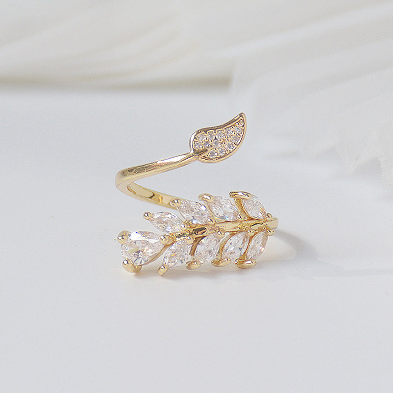 Gold Floral Leaf Ring against white background