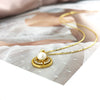 Gold Freshwater Pearl Pendant Necklace laying flat to show dimension of necklace.