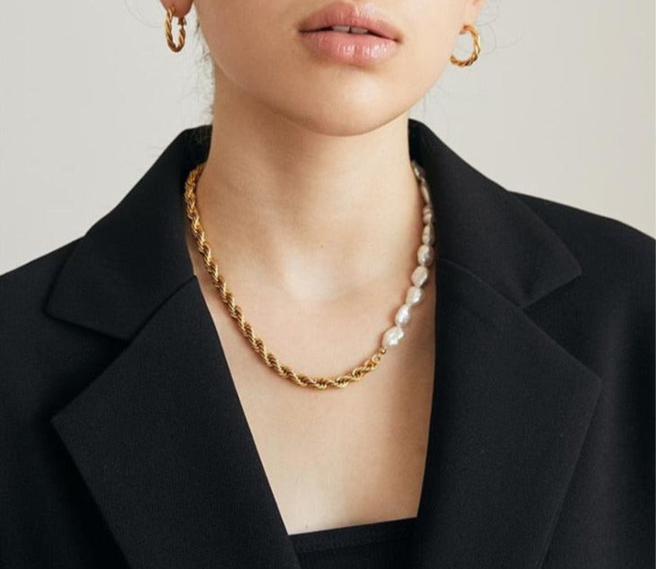 Woman with black business coat wearing Rope Chain with Pearls and Gold Rope Hoops from NAZ Parure Jewelry.
