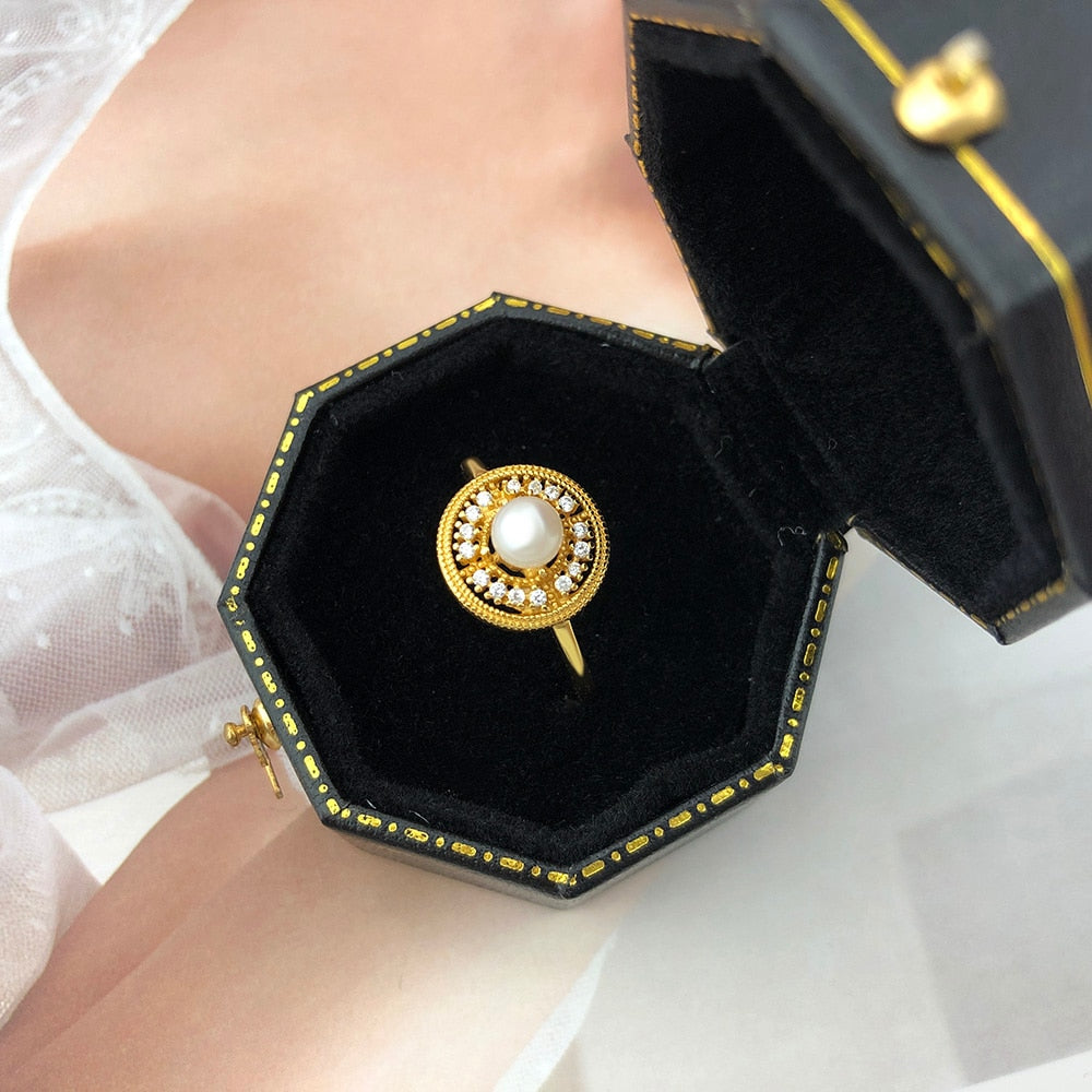 14K Gold Plated Freshwater Pearl Ring inside a black octagon shaped jewelry box.