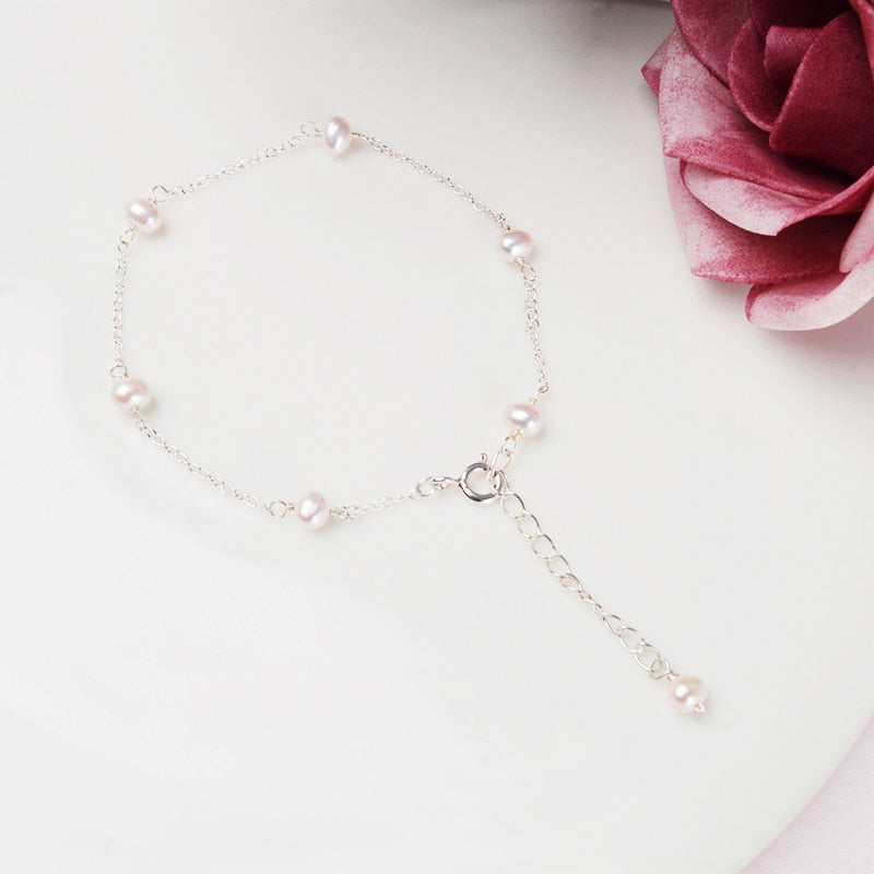 Sterling Pearl Bracelet laying against a white background.