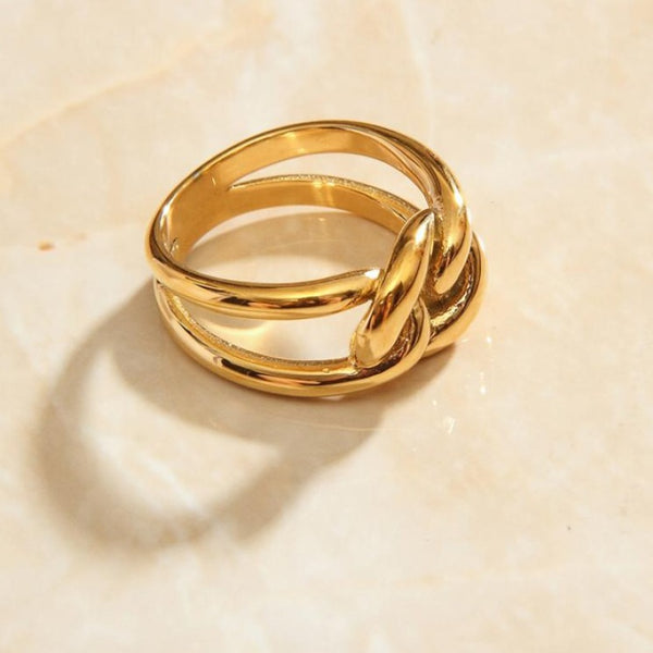 18k gold plated Double knot ring used as a statement piece from NAZ Parure.