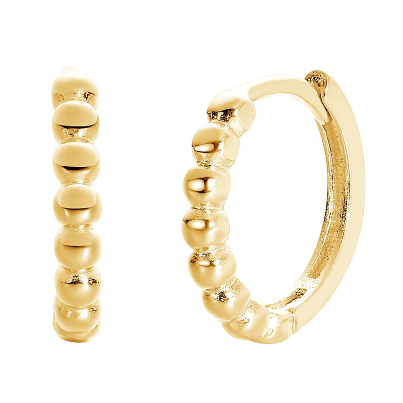 Close up of 18k gold-plated Beads of Love Hoop Earrings with white background.