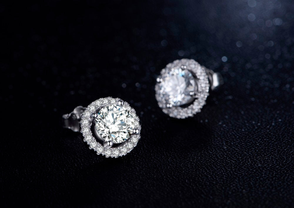 Close up of Halo Solitaire Studs from NAZ Parure Jewelry.