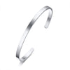 Stainless steel Simple Cuff Bangle on white background.