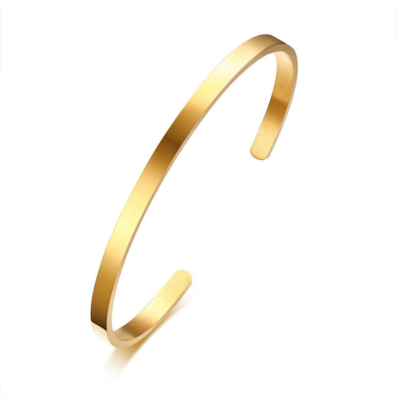 Gold IPL plated Simple Cuff Bangle on white background.