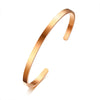 Rose gold plated Simple Cuff Bangle on white background.