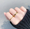 Gold Leaves Ring and Gold Wheat Ring on hand.
