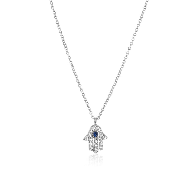 Hamsa brings good luck, happiness, health, good fortune and protection. Our dainty Hamsa Necklace is lined with small cubic zirconia and a blue stone. 