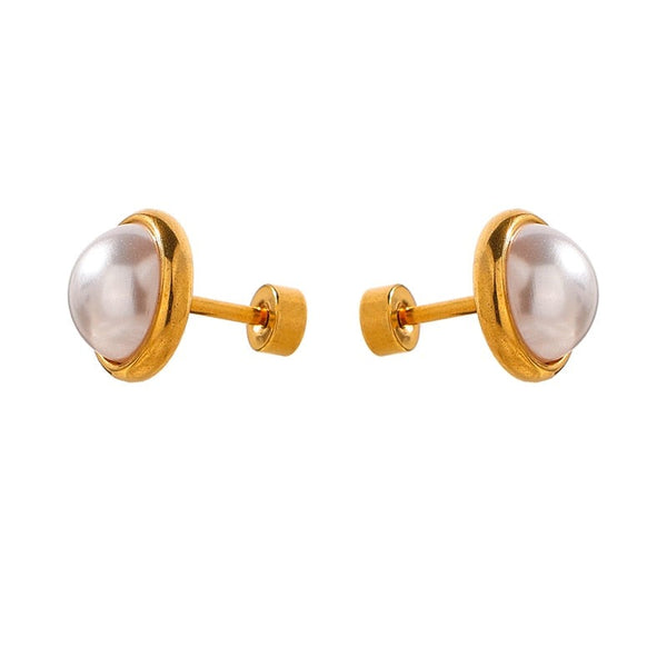 Pearl with Gold Halo Studs from NAZ Parure on white background.