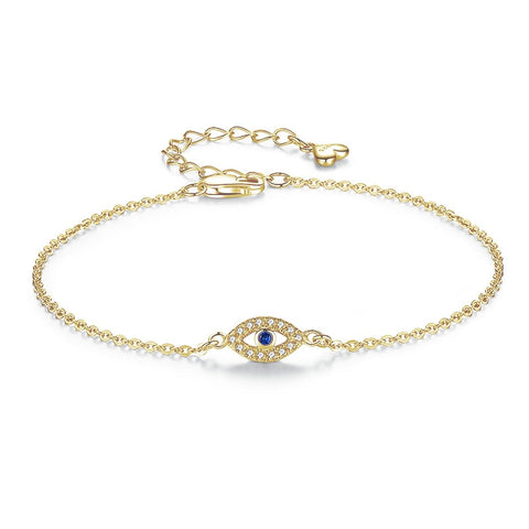 Dainty 18K gold plated Evil Eye Bracelet with zirconia bordering blue gem in center.