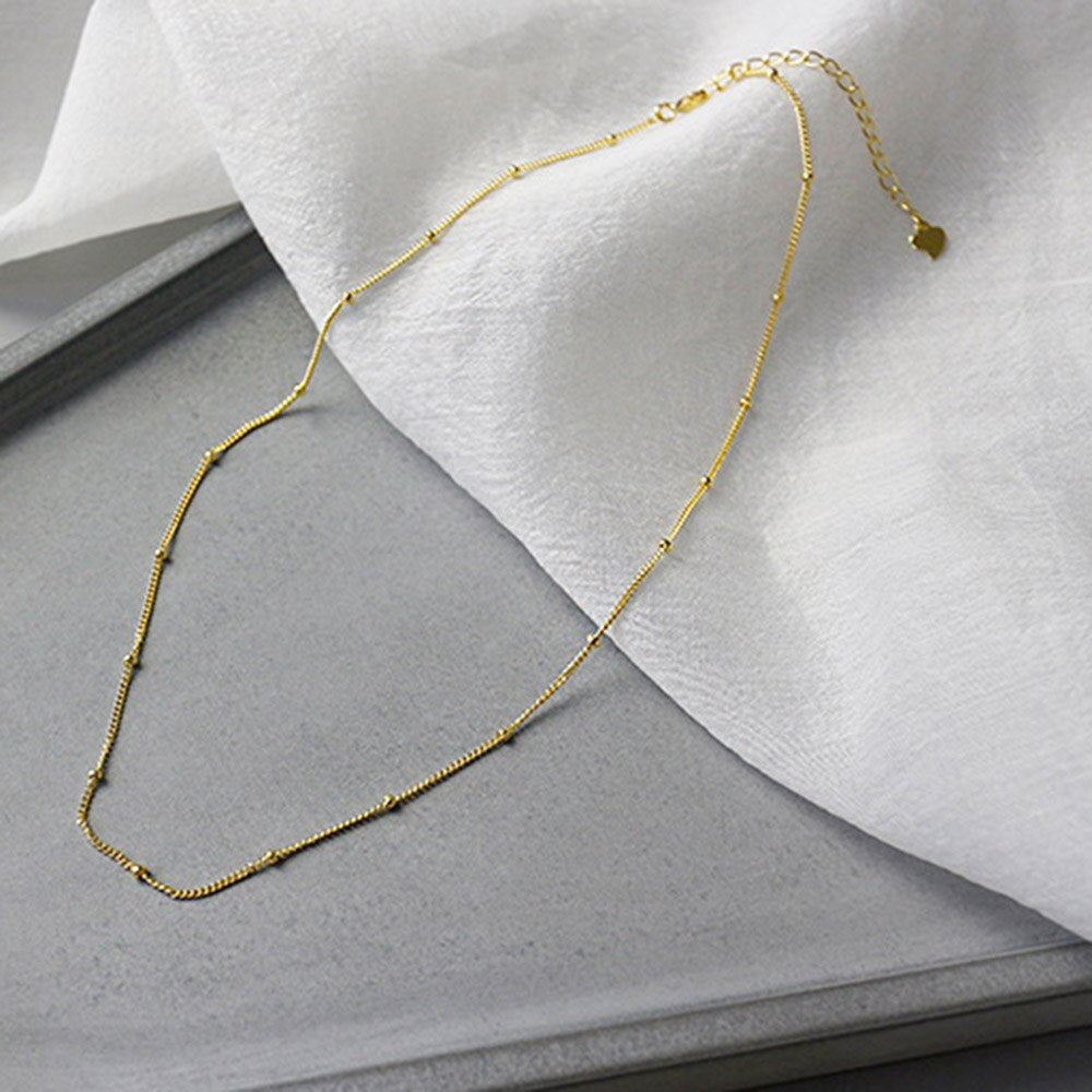 Full view of 18K gold plated Thin Beaded Choker with extension. 