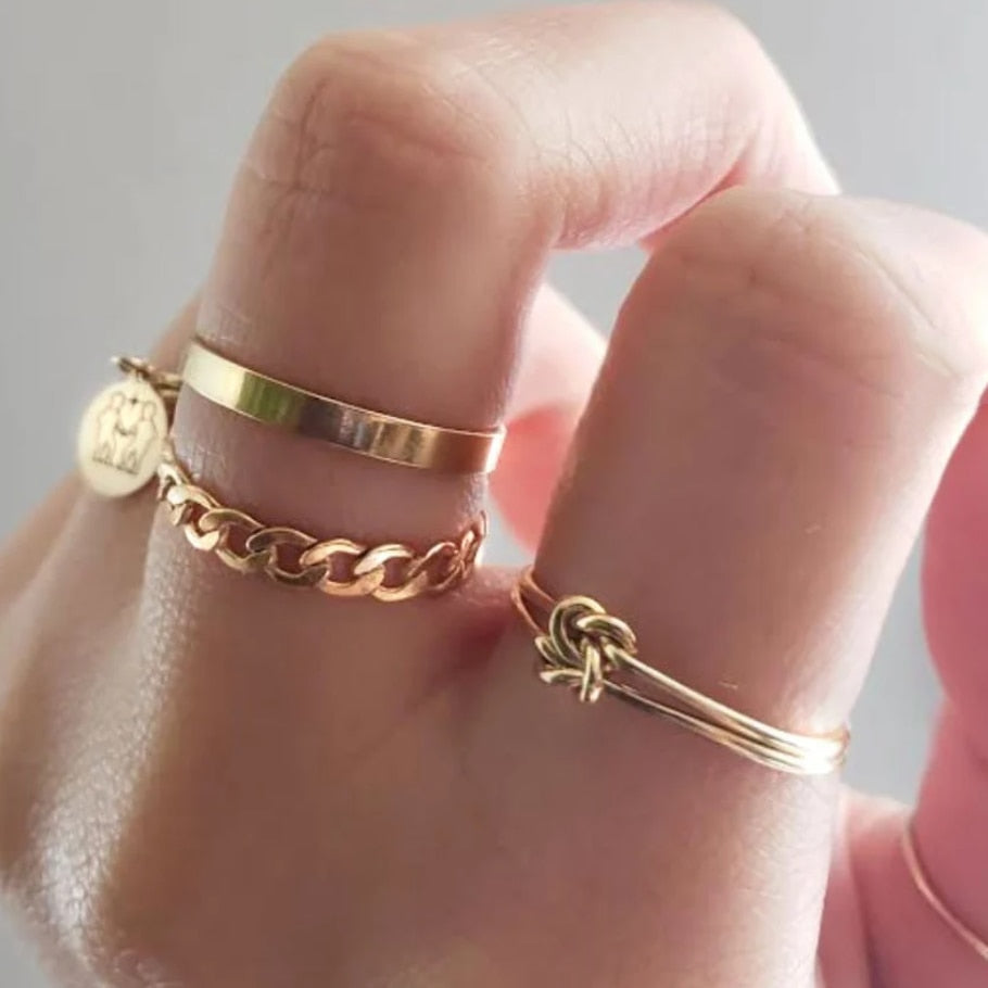 18K Gold-Filled Knot Ring stacked with gold chain link ring and gold-filled infinity band
