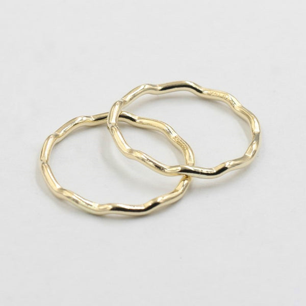 Two 14K Gold-Filled Thin Wave Rings on white background