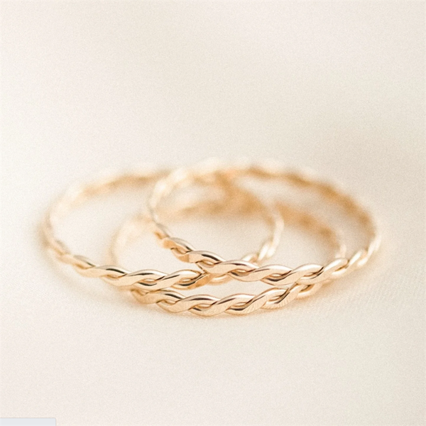 Three 14K Gold-filled Thin Braid Rings stacked on top of each other with white background - [NAZ Parure]