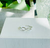 Close up of 925 Sterling SIlver Simply Infinity ring by NAZ Parure.