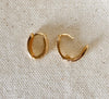 14K Gold Filled Zirconia Oval Huggies showing how to open clasp
